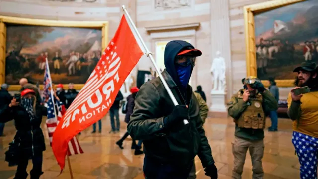 Proud Boys and Oath Keepers among over 1,500 Capitol riot defendants pardoned by Trump-BBC