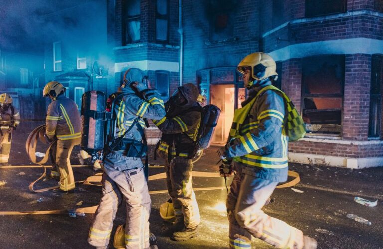 Fifteen PSNI officers were injured and four homes were set ablaze as trouble erupted in Ballymena last night.