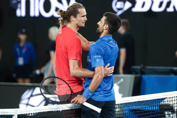 Djokovic wins easily as city celebrates soccer -Djokovic wins easily as city celebrates soccer