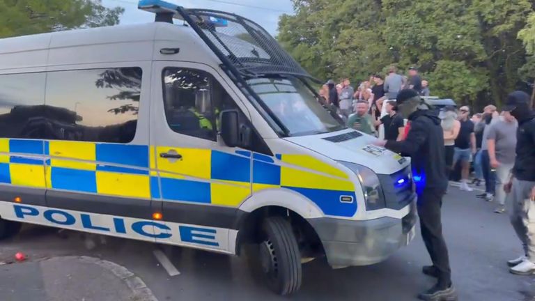 Police hurt and arrests made as violence erupts outside migrant hotel