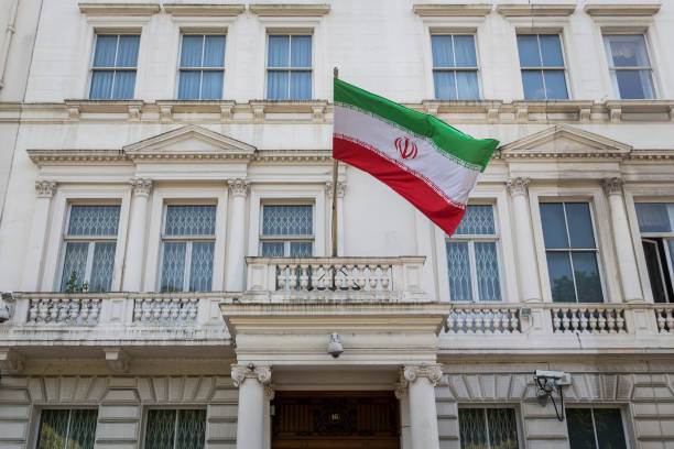 Seven men deny GBH after Iranian embassy protest attack in London