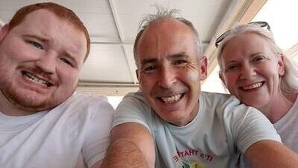 Man charged with murder of three members of his family”