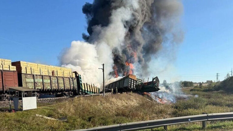Firefighters Battle Massive Blaze After Truck Collision Derails Train in Western Russia