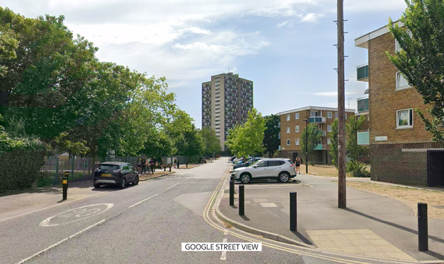 An 18-year-old man has been arrested on suspension of murder after woman fell from block of flats.