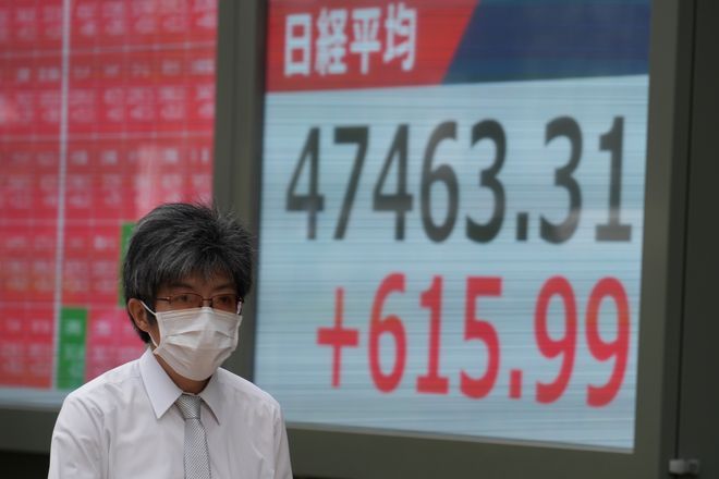 World shares swing higher after a wobbly day on Wall Street .